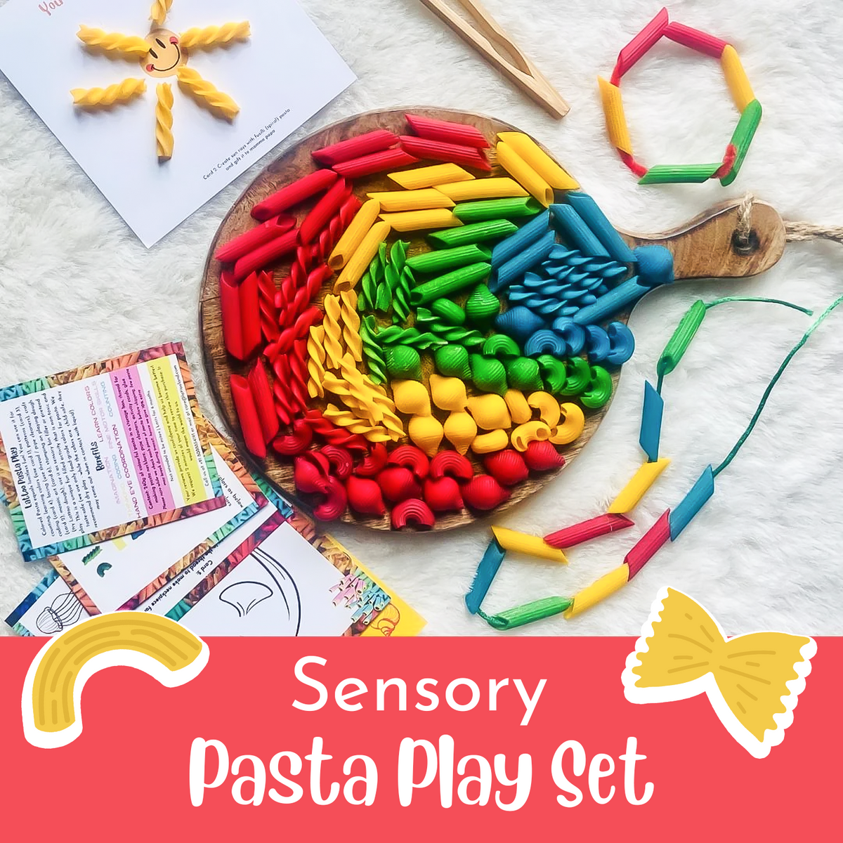 Red, yellow, green, blue coloured pastas for sensory play in Penne, Macaroni, Spiral & Shell shape, lacing activity, wooden tongs & activity cards.Colored pasta sensory toy for toddlers featuring a vibrant assortment of pasta shapes in various colors, perfect for engaging sensory play. The set includes tongs for developing fine motor skills as kids sort, scoop, and explore the textured pieces