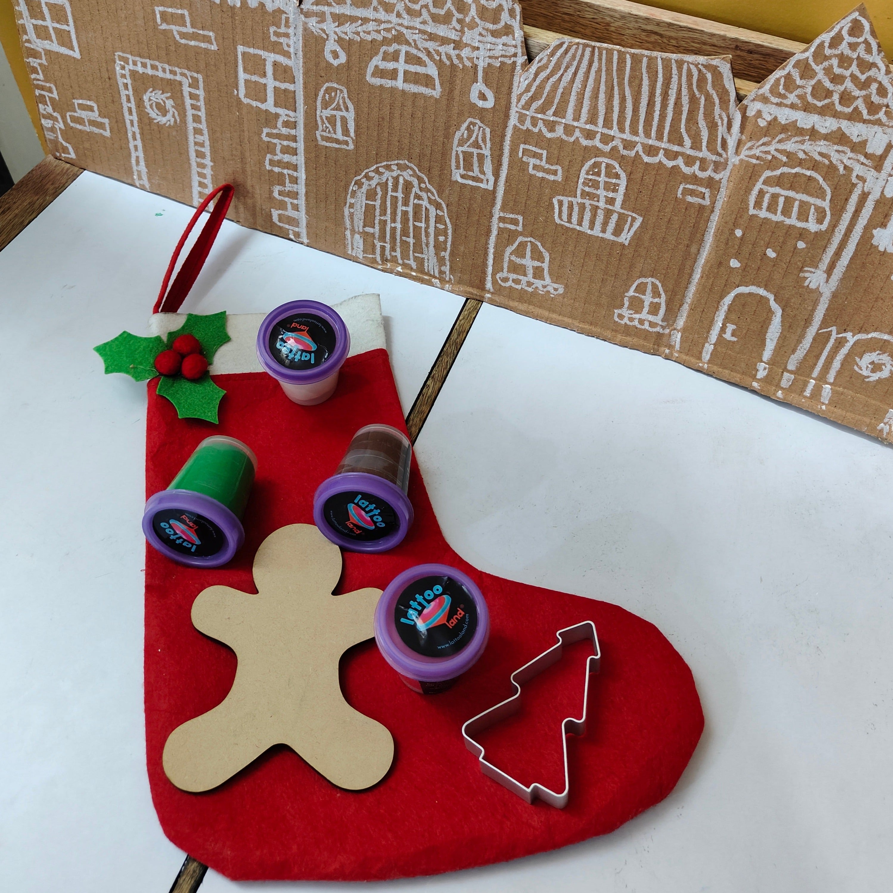 Close-up view of Christmas-themed play dough creations, showcasing artistic and sensory activities for kids' holiday fun.