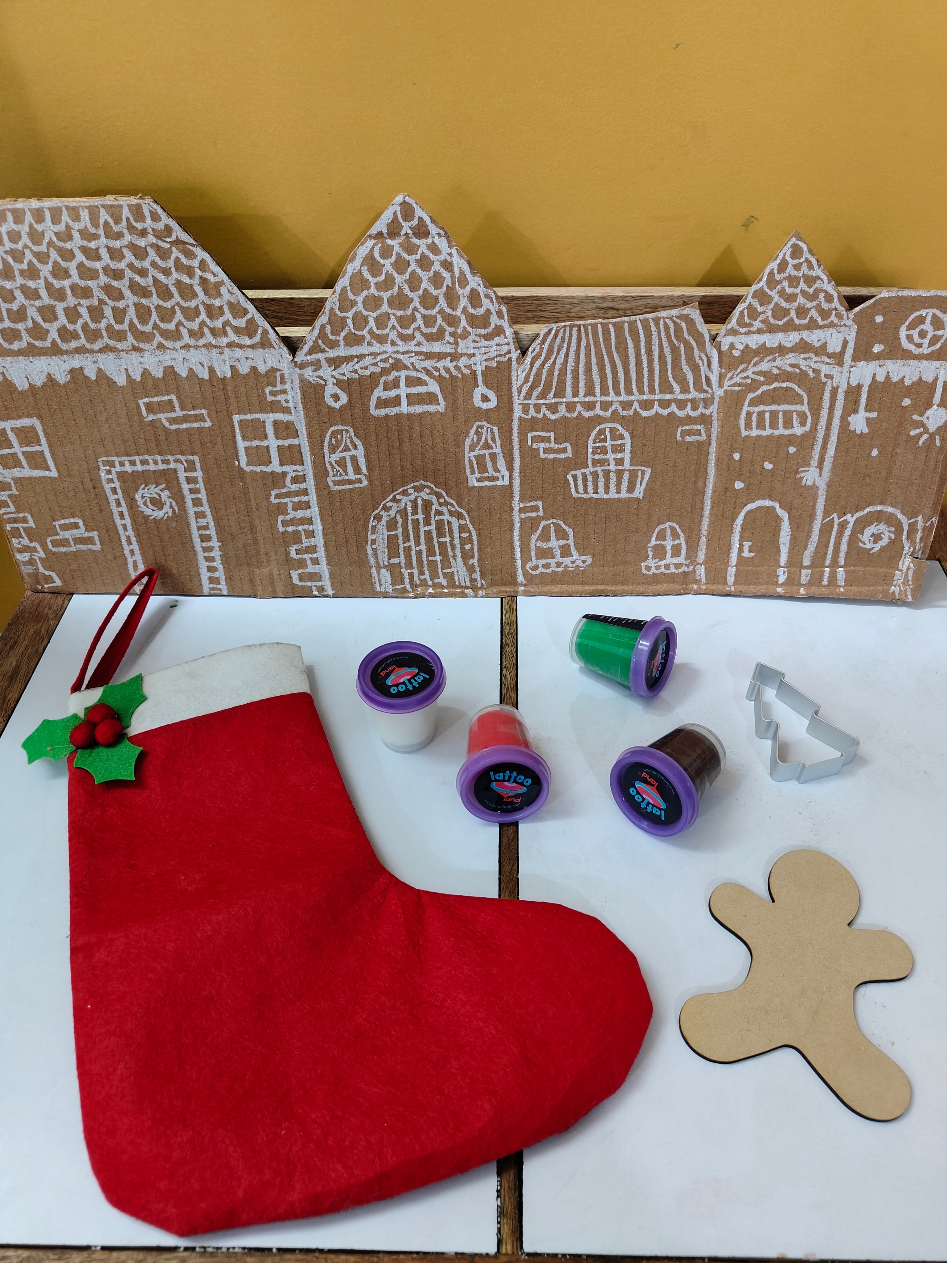 A setup of the Christmas dough kit for kids, combining sensory play, holiday crafts, and creative DIY Christmas decoration activities