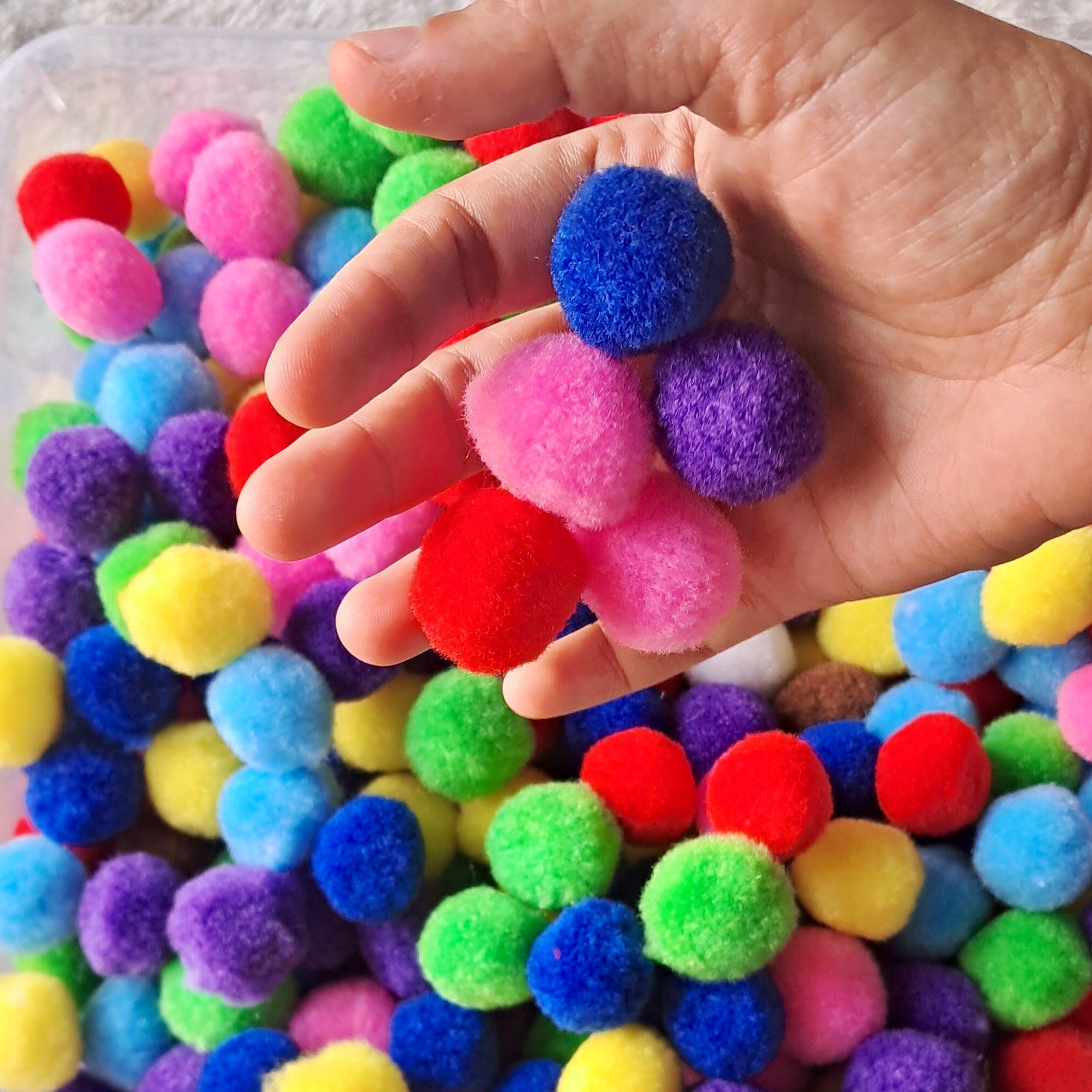 Non-toxic and safe pom poms for kids, perfect for sensory play and educational activities.