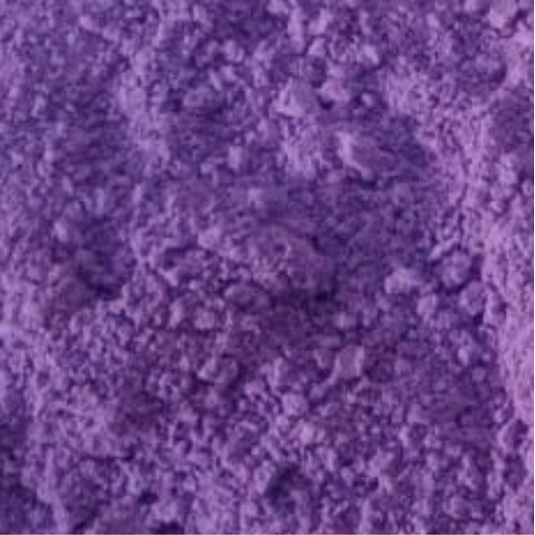 Rich purple Holi color (gulal) powder, finely textured and scattered, symbolizing joy, creativity, and celebration.