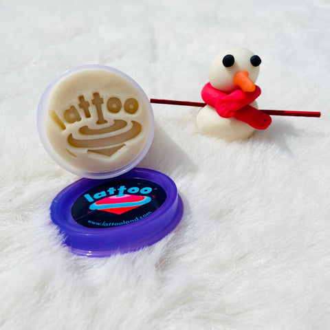  Non-toxic clay dough for children, made with safe organic materials for worry-free play.white colored lattoodough and snow man made of lattoodough