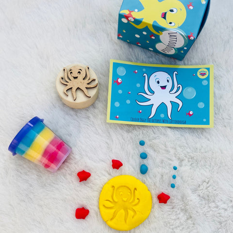 Non-toxic dough set with a wooden stamp, safe and creative play materials for kids.